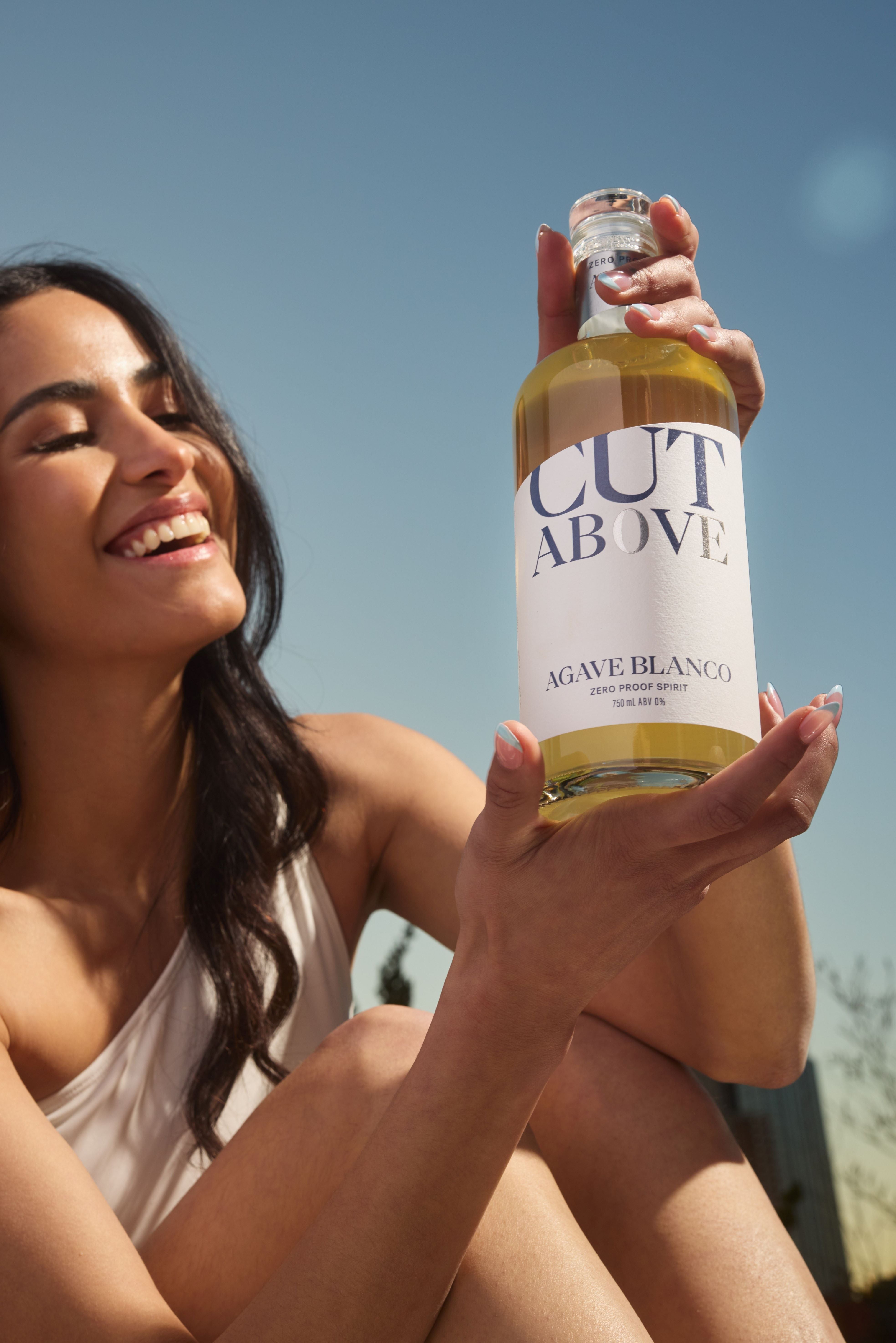 Margarita Cocktail Kit - Cut Above Spirits - Nonalcoholic - Mocktail - Tequila Alternative - Gift - Woman - Holding Bottle