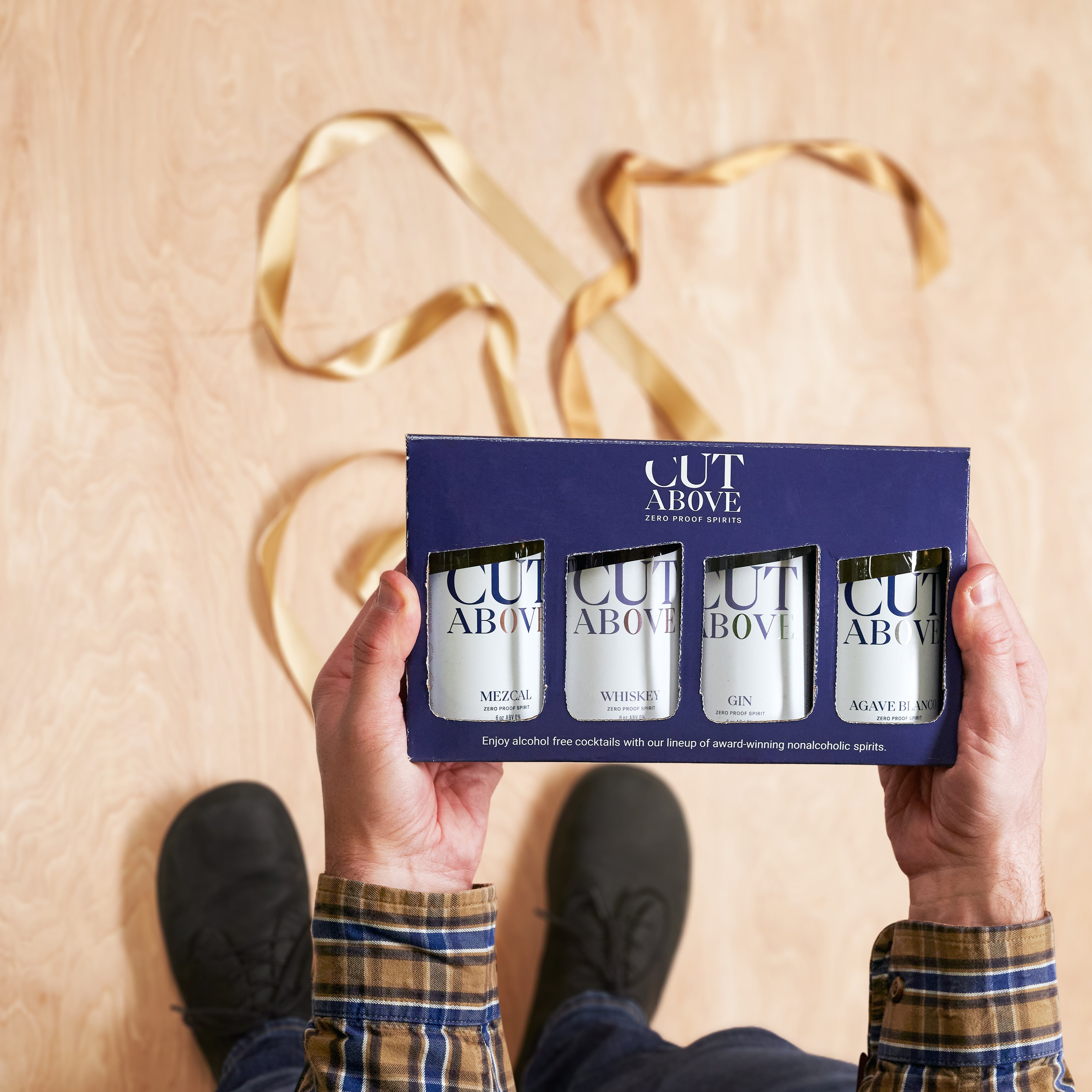 Variety Gift Set - Mini Bottles - Cut Above Spirits - Nonalcoholic - Mocktail - Gin Alternative - Gift - Hands Holding Box